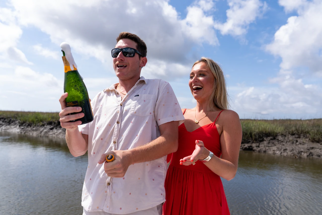 A wedding or engagement moment photographed by Stephen Groves of CaptureCHS.