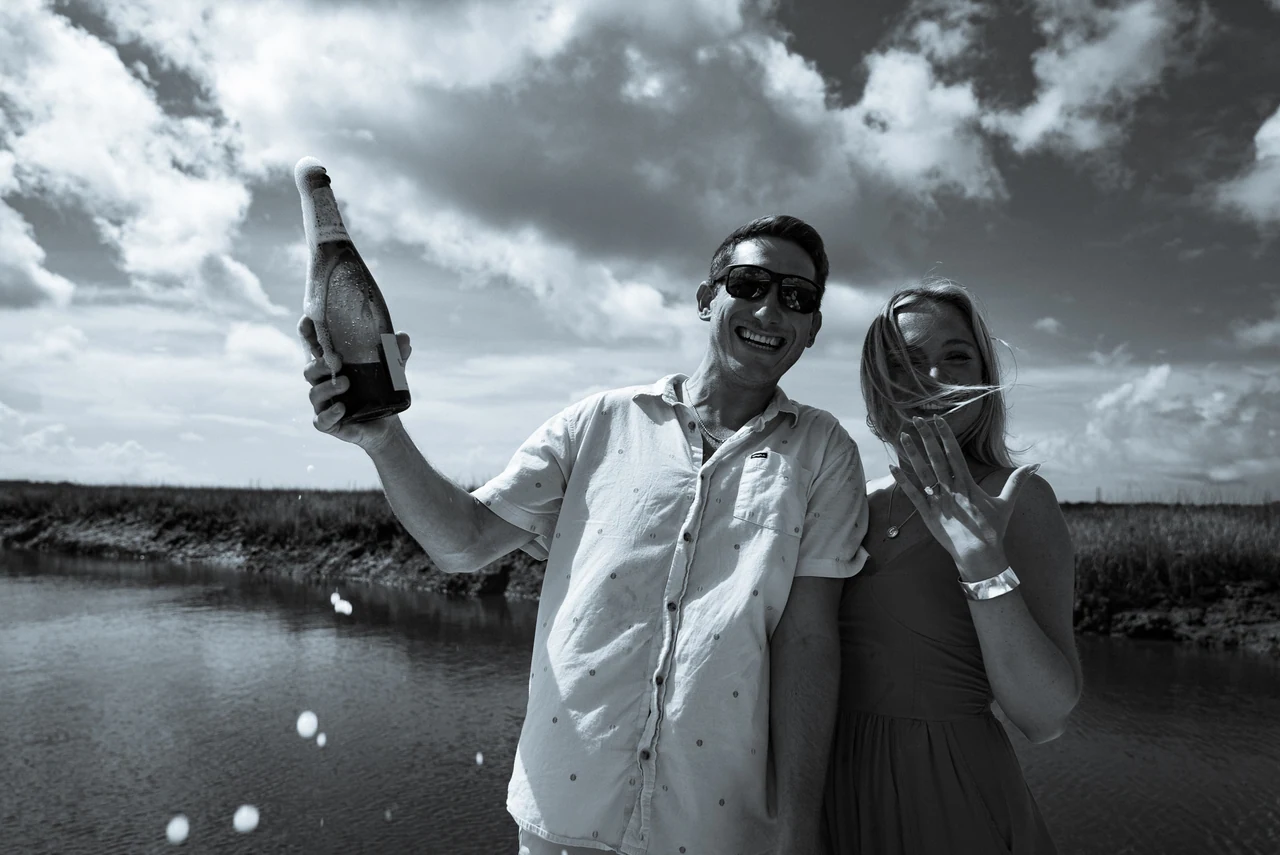 A wedding or engagement moment photographed by Stephen Groves of CaptureCHS.
